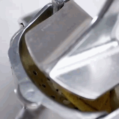 Hand-Held Citrus Press with Ergonomic Grip for Lemons and Oranges
