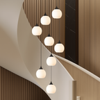 Tall Glass and Metal LED Staircase Chandelier in Black