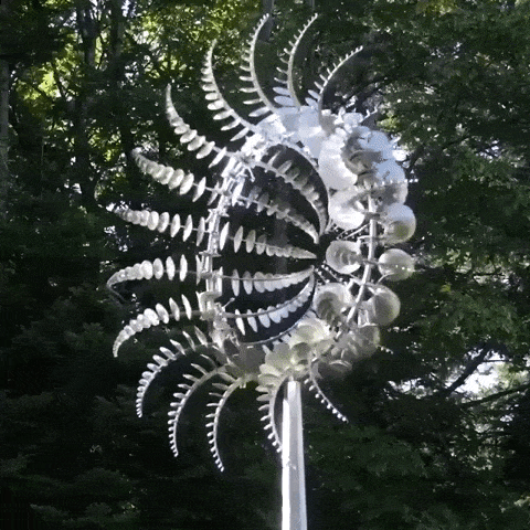Sculptural Metal Garden Wind Spinner with Layered Blades