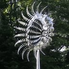 Sculptural Metal Garden Wind Spinner with Layered Blades