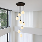 Tall Glass and Metal LED Staircase Chandelier in Black