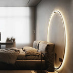 Round Minimalist LED Wall Light with Backlit Glow