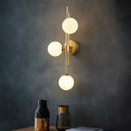 Modern Wall Light with Three Glass Globes, Brass Finish