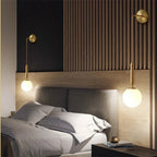 Frosted Glass Globe Wall Light on Slim Arm, Gold or Black