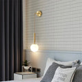 Frosted Glass Globe Wall Light on Slim Arm, Gold or Black