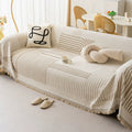 Geometric Patterned Sofa Throw with Tassel Edges